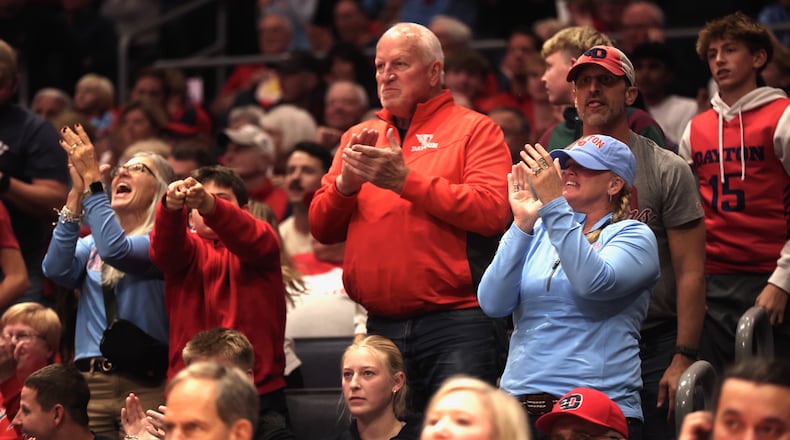 Dayton fans cheer during a game against Northwestern on Saturday, Nov. 9, 2024, at UD Arena. David Jablonski/Staff