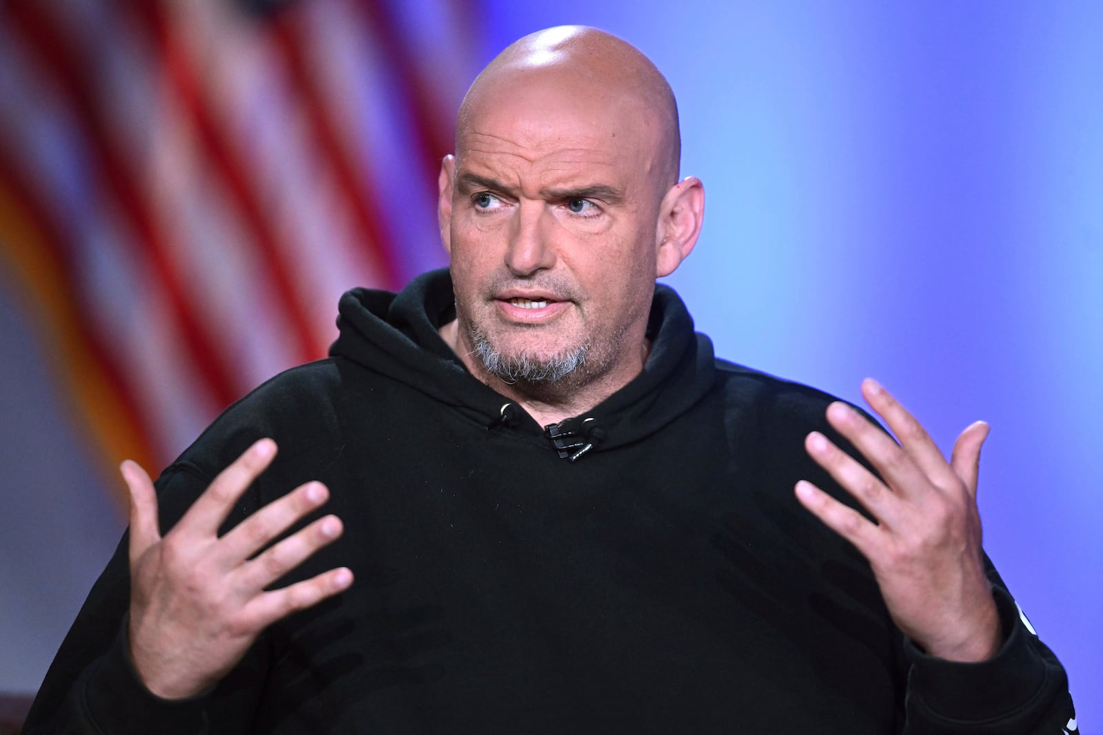 FILE - Sen. John Fetterman, D-Pa., participates in a debate with Sen. Dave McCormick, R-Pa., not shown, at the Edward M. Kennedy Institute for the United States Senate, June 2, 2025, in Boston, as live-streamed on Fox Nation. (AP Photo/Steven Senne)