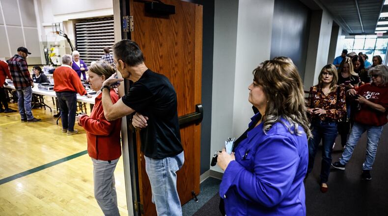 Voters waited 10 to 15 minutes to vote Tuesday afternoon around 5:00 PM at Sinclair College South. Jim Noelker/Staff