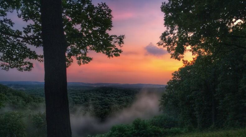 Hesitation Point is one of the vistas at Brown County State Park. Natural fog blankets the rolling hills at dawn. CONNIE POST/STAFF