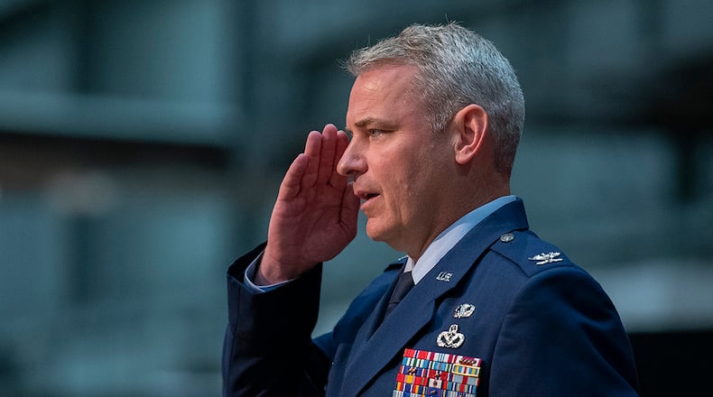 Col. Christopher Meeker returns his first salute as 88th Air Base Wing and installation commander during a change of command ceremony July 7, 2022 inside the National Museum of the U.S. Air Force. U.S. AIR FORCE PHOTO/R.J. ORIEZ