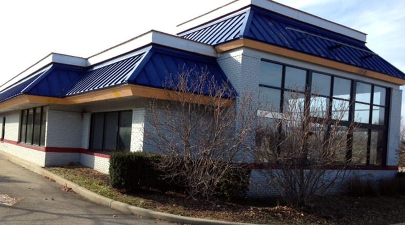 Grismer Tire & Auto plans to purchased this former Burger King at 4125 Wilmington Pike in Kettering to make way for a new repair shop. MARK FISHER/STAFF