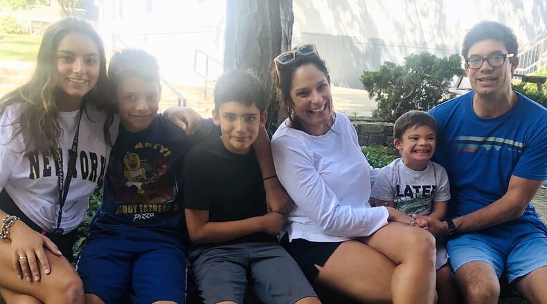The Holzberg family was surprised and grateful to receive the support of family, friends and colleagues as well as the community when they raised $18,000 in 24 hours to help get their son George a service dog. George has Down syndrome. L-R Helen, Lewis, Leo, Angie, George and Anthony Holzberg. CONTRIBUTED