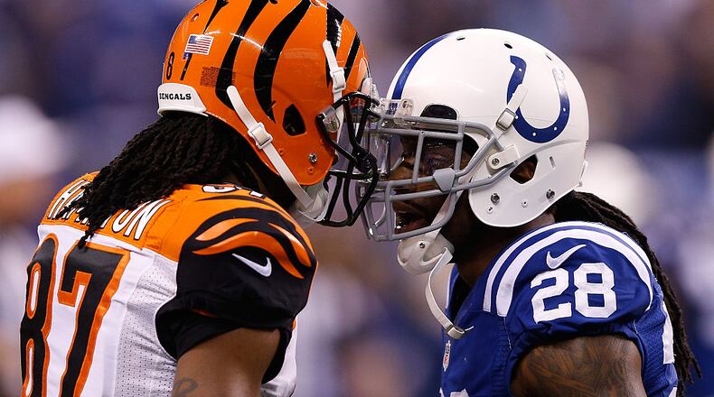 INDIANAPOLIS, IN - JANUARY 04: Cobi Hamilton #87 of the Cincinnati Bengals and Greg Toler #28 of the Indianapolis Colts exchange words in the first half during their AFC Wild Card game at Lucas Oil Stadium on January 4, 2015 in Indianapolis, Indiana. (Photo by Joe Robbins/Getty Images)