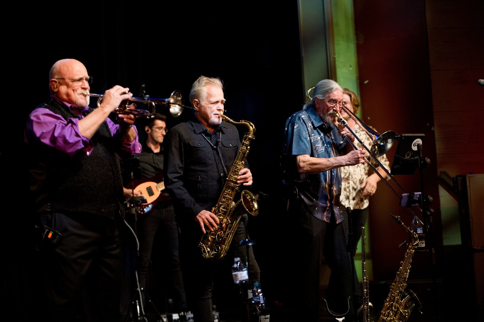 Chris Horton (left) on trumpet with the horn section for Chi-Town Transit Authority, performing in a Miami Valley Community Concert Association program at Centerville Performing Arts Center in Centerville on Monday.