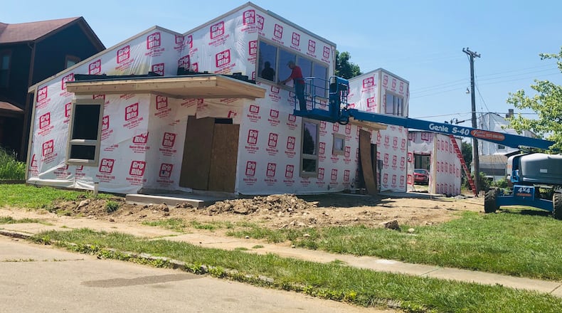 New single-family homes are being built on the western end of South Park by the owners of Coco’s Bistro. CORNELIUS FROLIK / STAFF