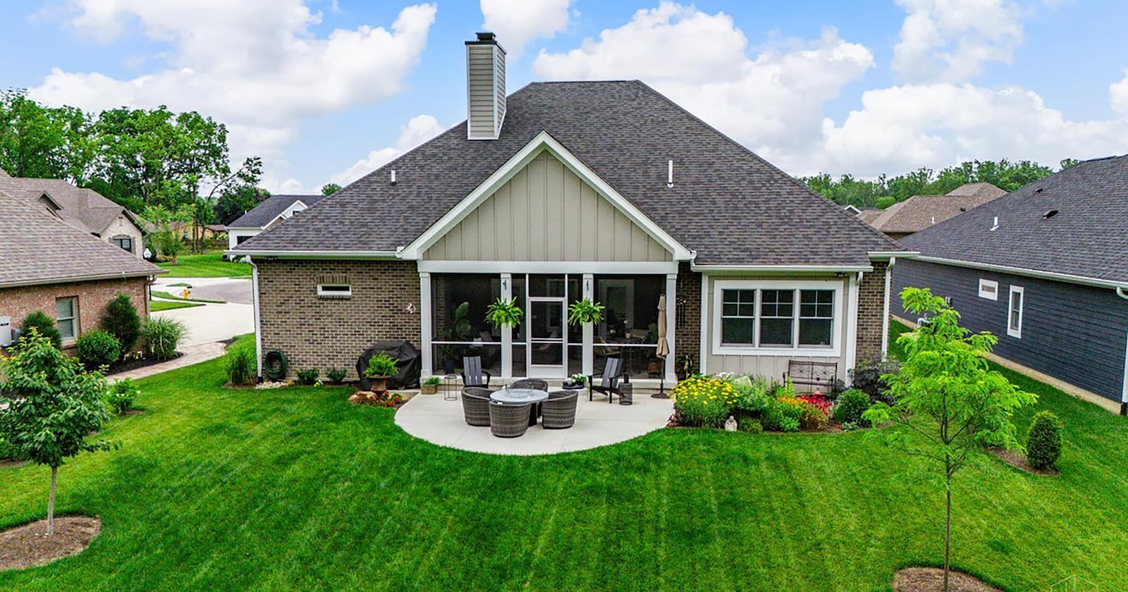 The rear of the home has a screened in porch and concrete patio. CONTRIBUTED