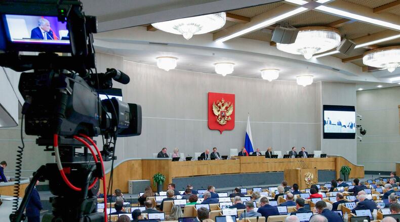 In this photo provided by The State Duma, Lower House of the Russian Parliament Press Service, deputies attend a session at the State Duma, the lower house of the Russian parliament in Moscow, Tuesday, Oct. 28, 2025. (The State Duma, Lower House of the Russian Parliament Press Service via AP)