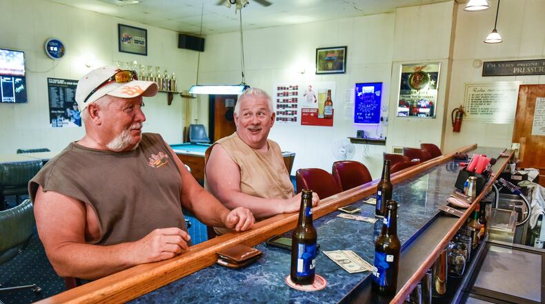 Doug Freeze (left) and Larry Black at the bar inside The American Legion in Franklin. The American Legion Post 149 in Franklin is struggling with membership and will close during the summer with hopes of opening back up in September.