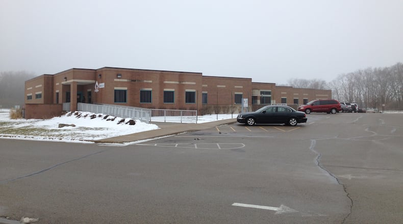 The Miami County Sheriff’s Office in 2012 questioned the amount paid to Tremco to replace the roof on the Miami County Job and Family Services Building, shown here. Staff Photo by Amanda Seitz