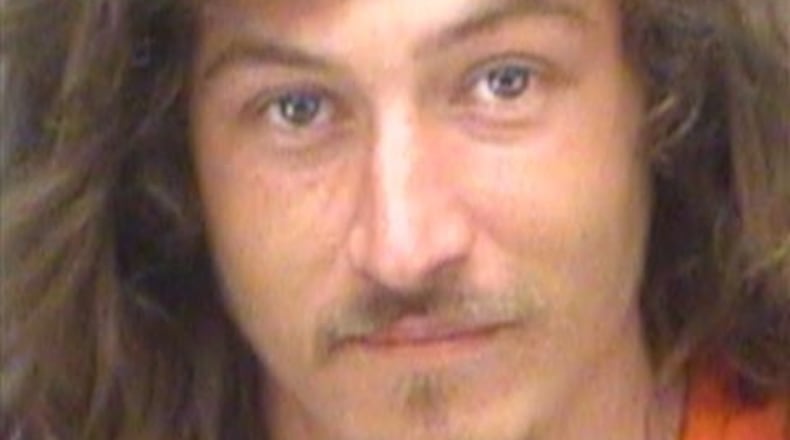 John McGarry was arrested and charged with reckless driving, resisting arrest without violence and driving with a suspended license, police said. (Clearwater Police Department/Clearwater Police Department)