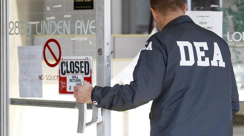 Federal Drug Enforcement Agency agents served a federal search warrant early Thursday, Oct. 4, 2012, at the David C. Kirkwood s family practice at 2838 Linden Ave. in Dayton.