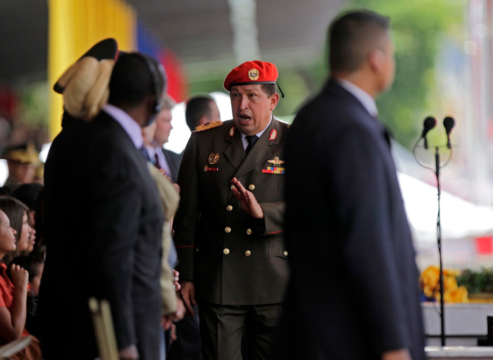 FILE - Venezuela's President Hugo Chavez salutes as he arrives to preside over a civilian-military parade part of Venezuela's 200th independence anniversary celebrations in Caracas, April 19, 2010.(AP Photo/Ariana Cubillos, File)