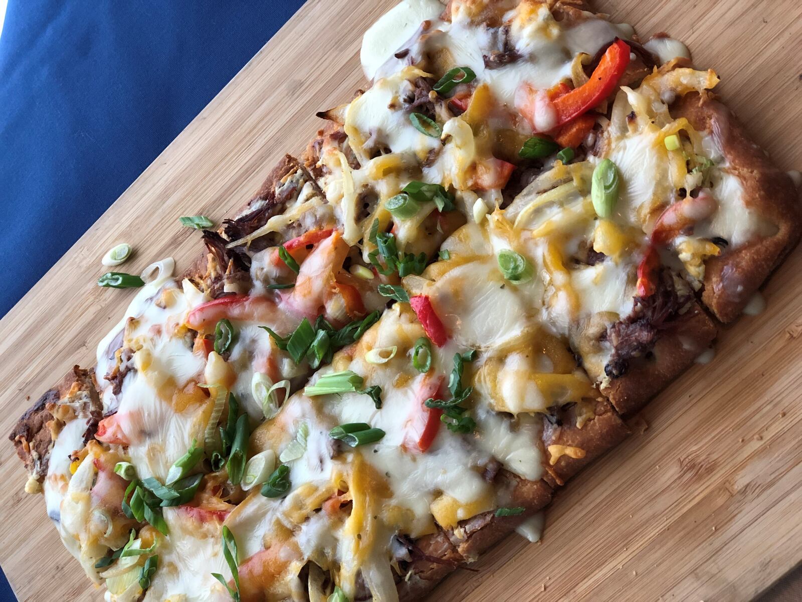 Dayton Club's Wilbur's Wild Mushroom Flatbread ($12)  Dish includes Boursin spread, Havarti, baby arugula, lemon vinaigrette