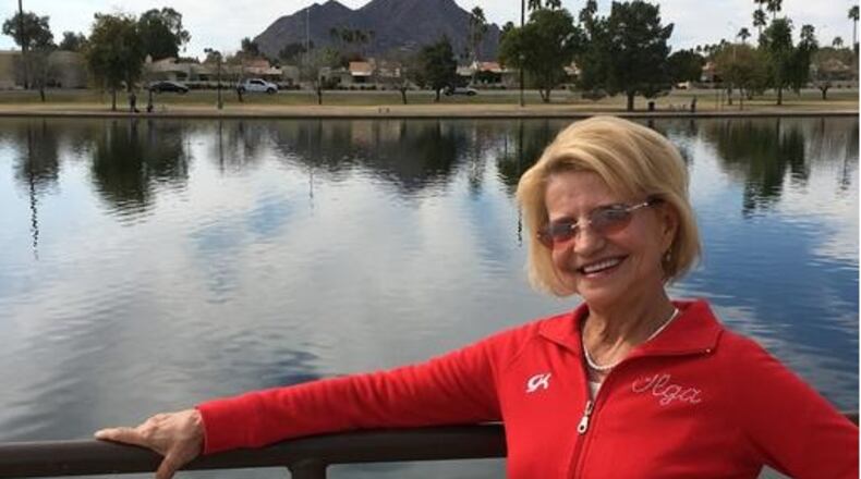 In this Feb. 14, 2017 photo, Olympic gold medal gymnast Olga Korbut, of Russia, poses in in Scottsdale, Ariz. At at 61, Korbut is at ease with her place in history as she enjoys the quiet life in Arizona. (AP Photo/John Marshall)