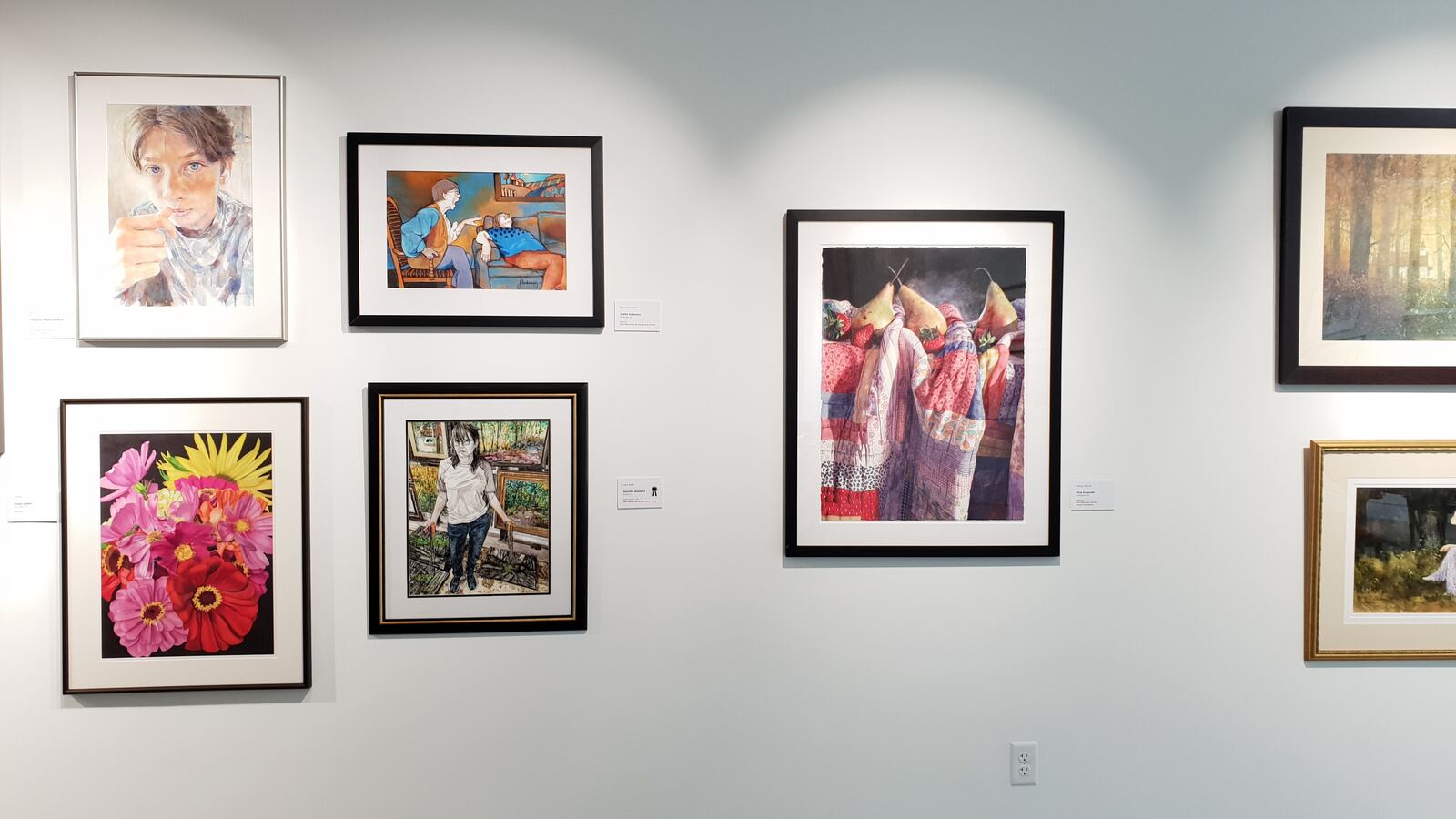 A number of watercolor pieces in the North Gallery at the Springfield Museum of Art that show a diverse range of colors and styles. CONTRIBUTED