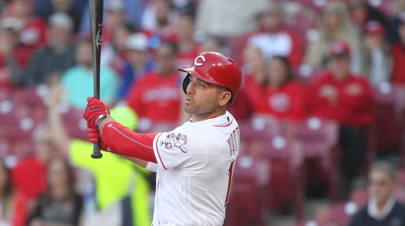 The Reds’ Joey Votto doubles against the Marlins on Tuesday, April 9, 2019, at Great American Ball Park in Cincinnati. David Jablonski/Staff