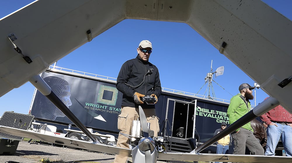 In this 2017 file photo, Dave Malek performed a safety check on a drone before flight-testing for the Air Force Research Lab at Springfield Beckley Municipal Airport. Bill Lackey/Staff