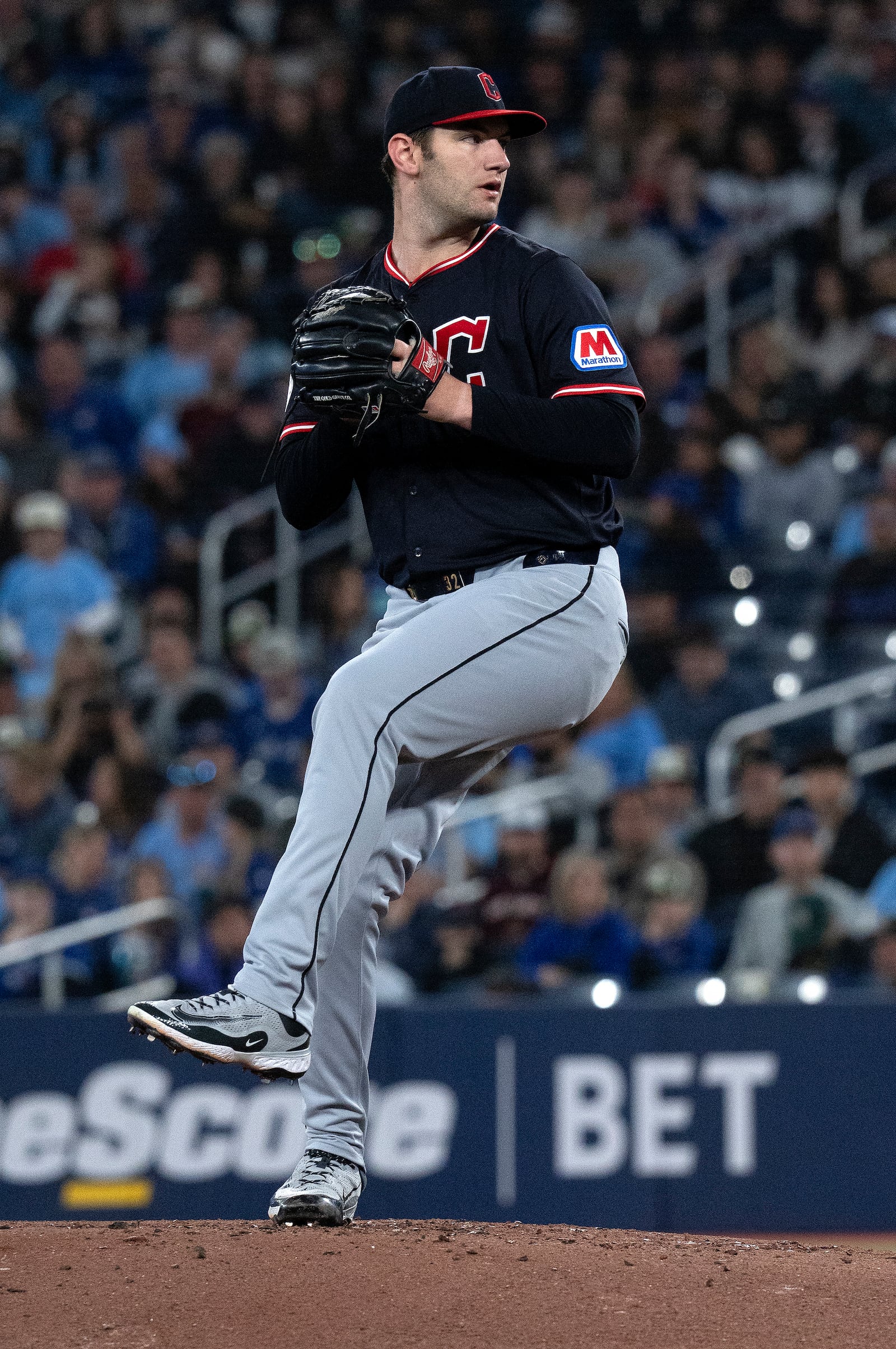 Cleveland Guardians starting pitcher Gavin Williams (32) throws to a Toronto Blue Jays batter during the first inning of a baseball game in Toronto, Saturday, May 3, 2025. (Jon Blacker/The Canadian Press via AP)