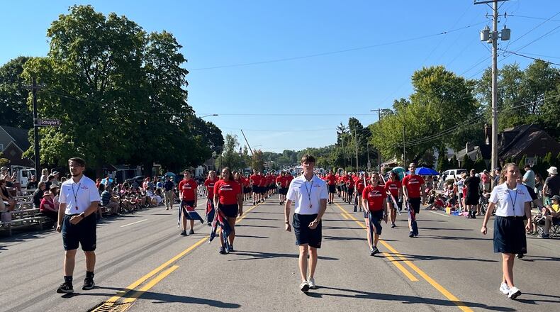 The University of Dayton Pride of Dayton marching band in the 2023 Kettering "Holiday at Home" parade. THOMAS GNAU/KETTERING