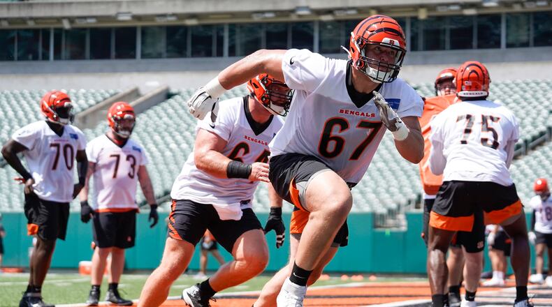 Cincinnati Bengals offensive lineman Cordell Volson (67) takes part in drills at the team's NFL football stadium, Tuesday, June 14, 2022, in Cincinnati. (AP Photo/Jeff Dean)