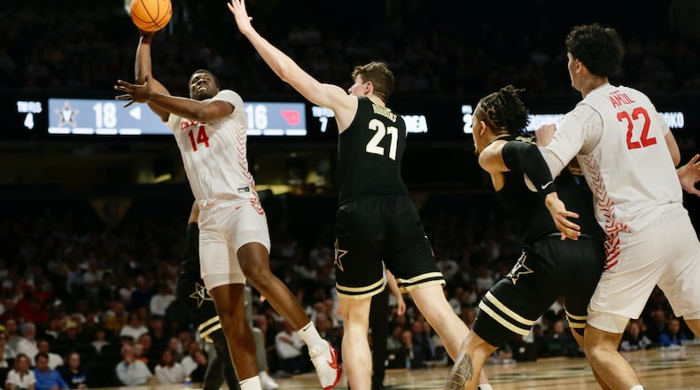 Dayton's Moulaye Sissoko scores against Vanderbilt in the second round of the NIT on Sunday, March 20, 2022, at Memorial Gymnasium in Nashville, Tenn. David Jablonski/Staff