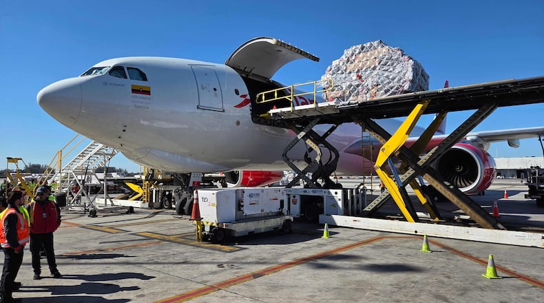 Boxes of Valentine's Day flowers arrive from Colombia at Miami International Airport, on Friday, Feb. 6, 2026, in Miami. (AP Photo/David Fischer)