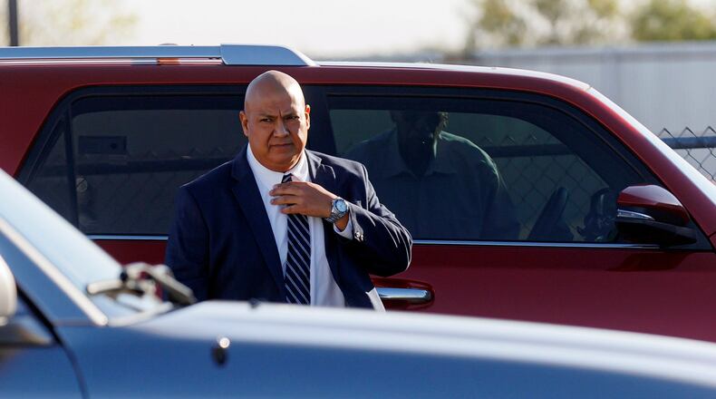 FILE - Former Uvalde school district police chief Pete Arredondo prepares to walk into the Uvalde County Justice Center for a pre-trial hearing on Dec. 19, 2024, in Uvalde, Texas. (Sam Owens/The San Antonio Express-News via AP, File)