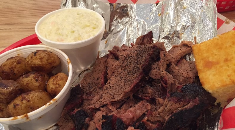 A one-pound serving of the beef brisket at Fatback’s Barbecue is definitely enough to share. Pictured with the roasted potatoes and cole slaw. We thank you kindly, Fatback’s. Contributed photo by Alexis Larsen