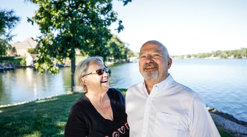 Miami Valley Hospital OBGYN Dr. Stephen Guy celebrates his first full day of retirement with his wife, Carol Guy, at their home on Shawnee Lake. Guy has been a doctor for 42 years. JIM NOELKER/STAFF
