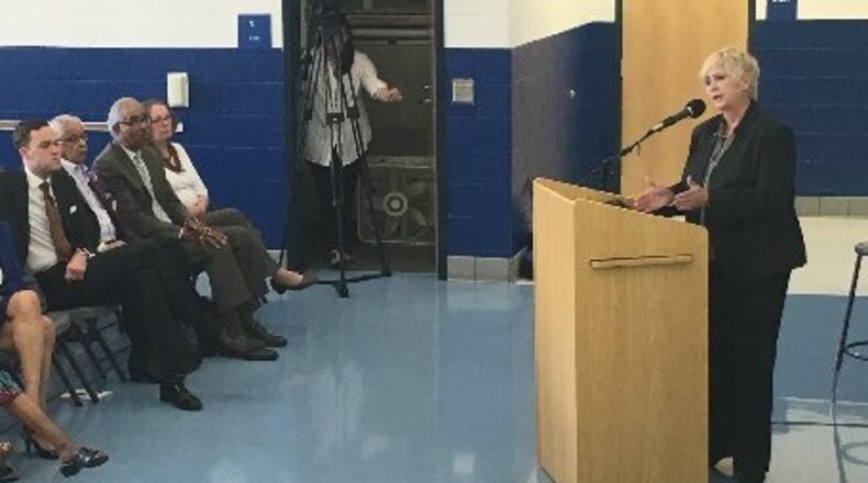 Rhonda Corr, then-candidate for Dayton’s school superintendent post, speaks to a community forum as school board members look on, Friday June 10, 2016, at River’s Edge Montessori School. JEREMY P. KELLEY / STAFF