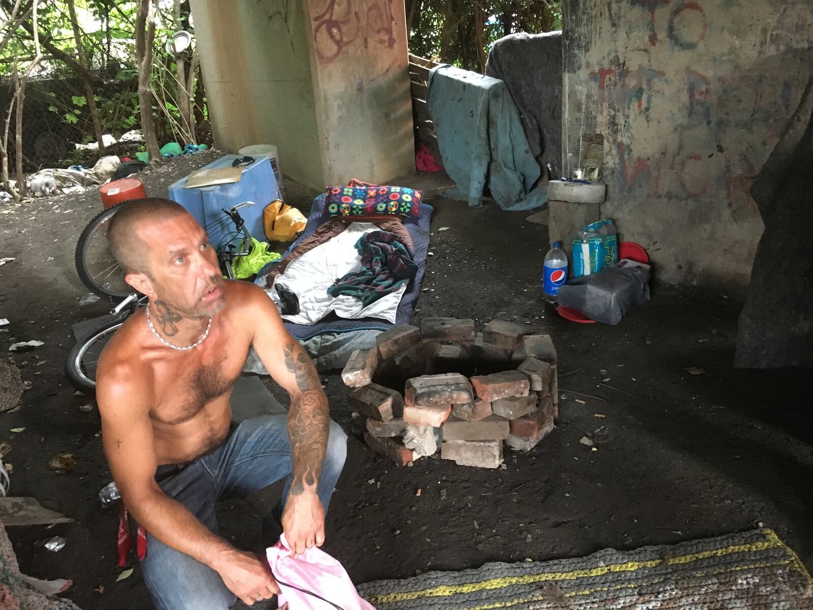 There s all kinds of people out here, said Kenny Sparks, 47, who had just woken up. He doesn t consider himself homeless. He often stays at his mom s place. He thinks of the underpass as his own space, like an efficiency apartment, he can stay at after a night of partying.