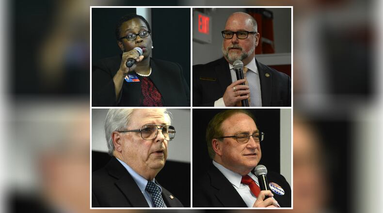 The four Democratic candidates for the 8th Congressional District talked on Tuesday to around 50 community members during the Butler County Democratic Party’s forum at the Miami Hamilton Downtown Center on High Street in Hamilton. The four are seeking the Democratic Party’s nomination in the May 8 primary election. Candidates include, starting clockwise, Vanessa Enoch of West Chester Twp., Matthew Guyette of Greenville, Ted Jones of Piqua and Bill Ebben of West Chester Twp. MICHAEL D. PITMAN/STAFF