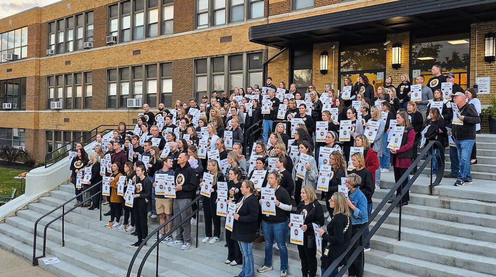 Teachers at Ross Schools announced today their union has authorized its contract negotiating team to exercise a labor stoppage option, if they choose to, during the team’s stalled labor contract talks with district officials. Teachers held a public rally in November in front of Ross Schools' central office building. (Photo By Nick Graham/Journal-News)