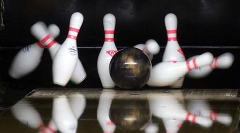 A ball scatters the pins during the final round of the 2008 PBA Central Region Dayton Open, Sunday, June 22, at Poelking Lanes South in Centerville.