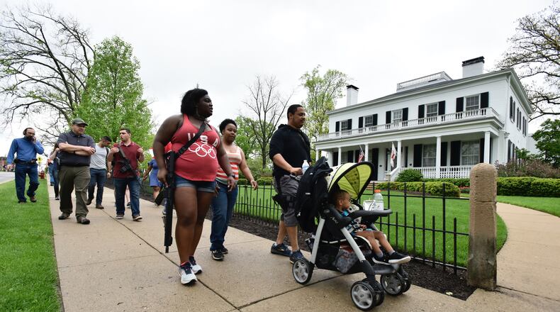 A parade through Miami University on Friday, May 3, 2019 supported open carry. NICK GRAHAM / STAFF
