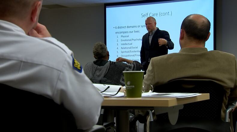 Josh Francis gives training to Dayton police officers.