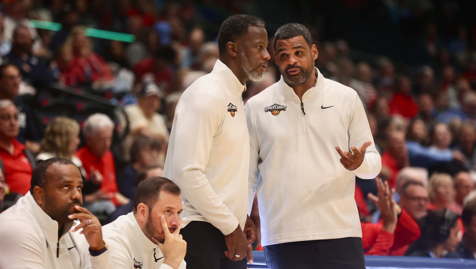 Dayton coaches Anthony Grant and Ricardo Greer talk during an exhibition game against Penn State on Sunday, Oct. 19, 2025, at UD Arena. The shortcomings of the 2024-25 season put more pressure on Grant and his staff entering the 2025-26 season, which begins at 7 p.m. Monday with a home game against Canisius. David Jablonski / Staff