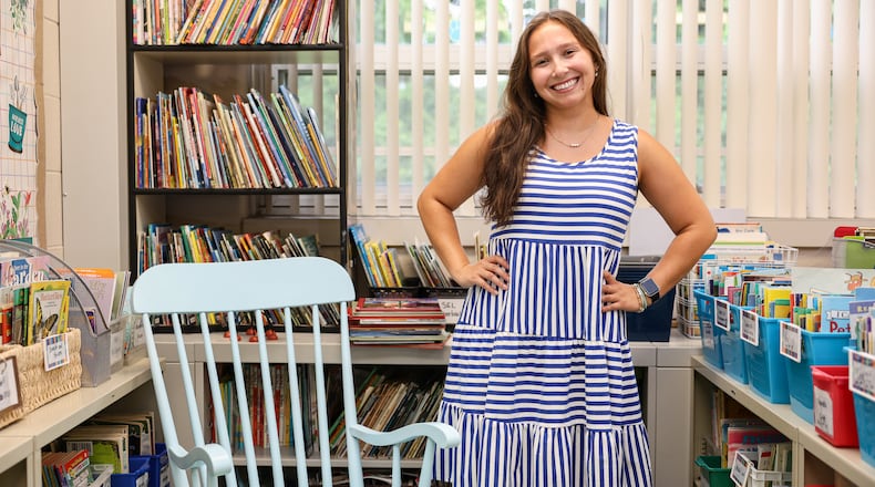 First-time teacher Emma Golden decorated her classroom at Centerville School District's Normandy Elementary to make it inviting for her second graders. To do so, she used a bulletin board with bright backgrounds, created a reading garden and an affirmation station and used her late grandmother’s rocker as a read-aloud chair. BRYANT BILLING/STAFF