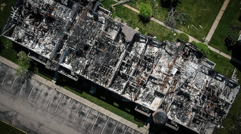 This is an aerial photo of a burned-out apartment building at the Woodland Hills complex in Trotwood in May 2022. The development sits empty three years after the 2019 Memorial Day tornadoes ripped through the area. JIM NOELKER/STAFF
