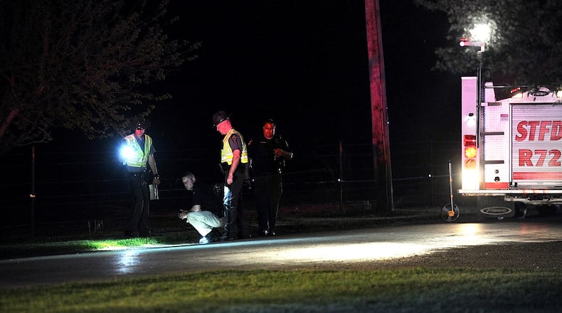 The Ohio state patrol is investigating where two juveniles and a dog were struck by a vehicle on Crabill Road in Green Township Clark County Tuesday night. MARSHALL GORBY \STAFF