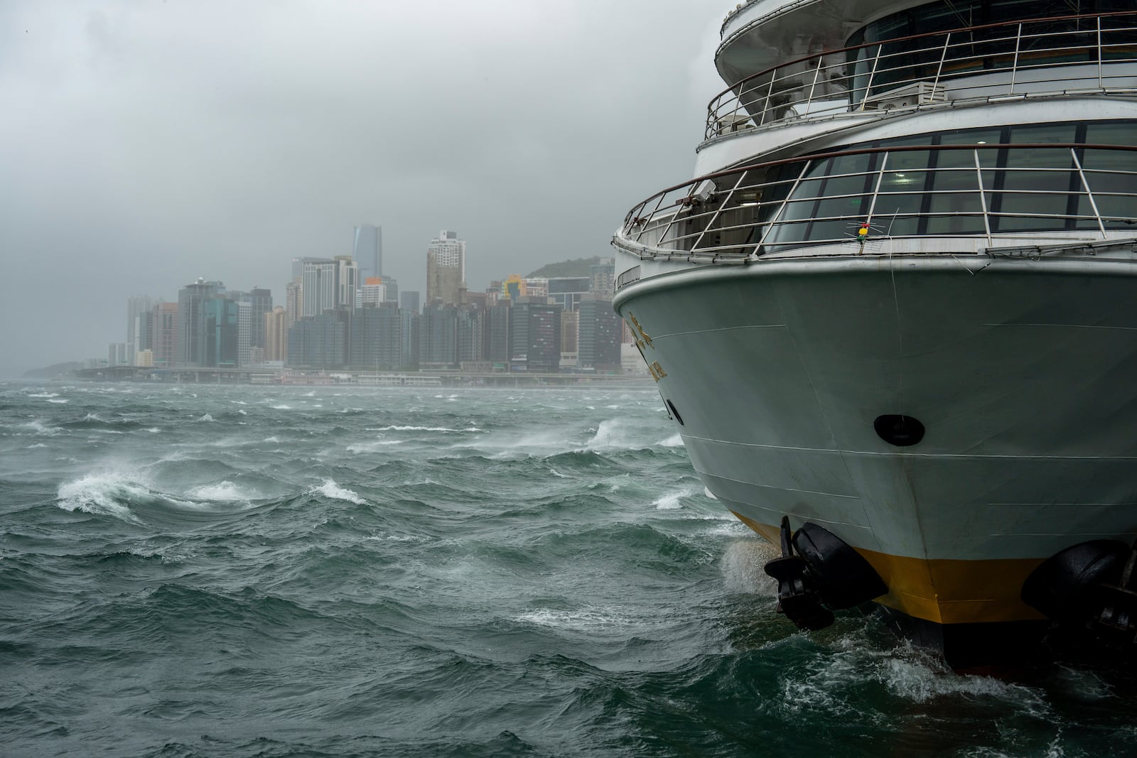 Waves are seen near the Victoria Harbor following the Typhoon Wipha, in Hong Kong, Sunday, July 20, 2025. (AP Photo/Vernon Yuen)