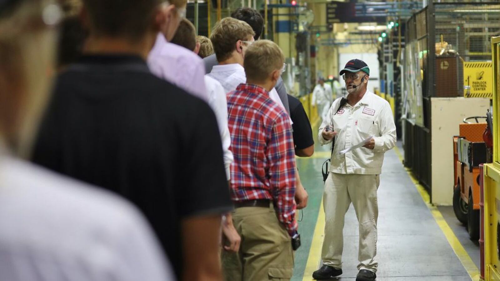 Honda Anna engine plant employee Mark Bollheimer hosts a plant tour with area high school students in 2018. CONTRIBUTED.