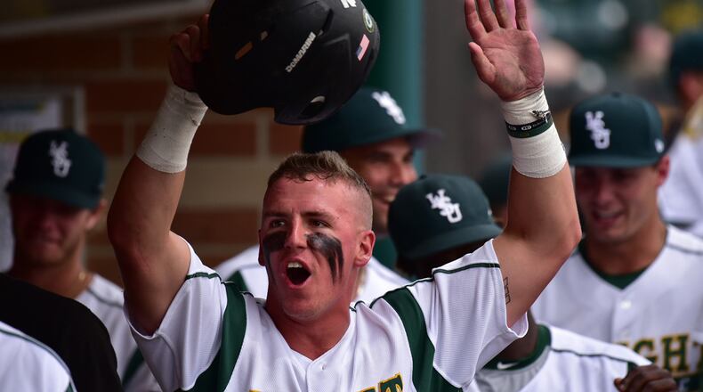 Wright State’s Peyton Burdick celebrates after scoring one of five Raiders runs in the first inning of the Horizon League championship game against UIC on Saturday at Nischwitz Stadium. JOSEPH CRAVEN/CONTRIBUTED PHOTO