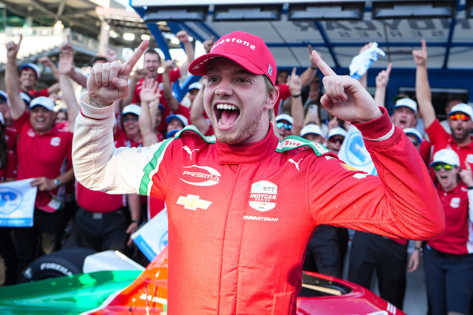 Robert Shwartzman, of Israel, celebrates after winning the pole position during qualifications for the Indianapolis 500 auto race at Indianapolis Motor Speedway in Indianapolis, Sunday, May 18, 2025. (AP Photo/Michael Conroy)