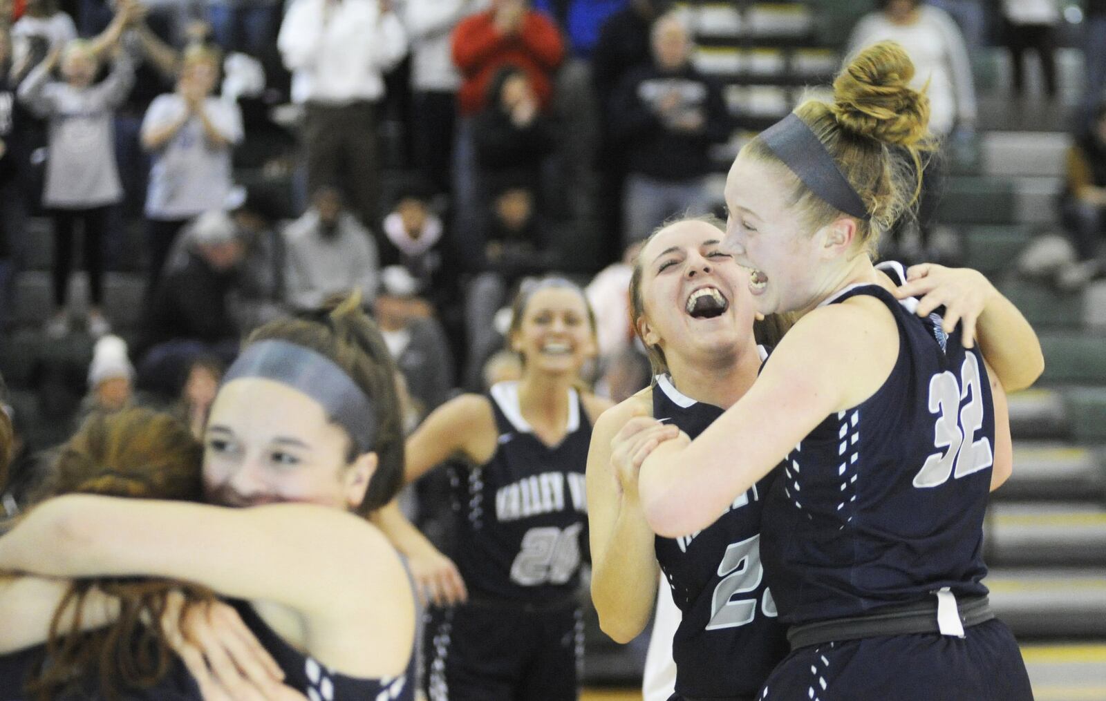 Jayna Black and Aubrey Stupp (right) of Valley View celebrate. Valley View defeated Cincinnati Roger Bacon 69-58 in a D-II girls high school basketball district final at Mason on Friday, March 1, 2019. MARC PENDLETON / STAFF