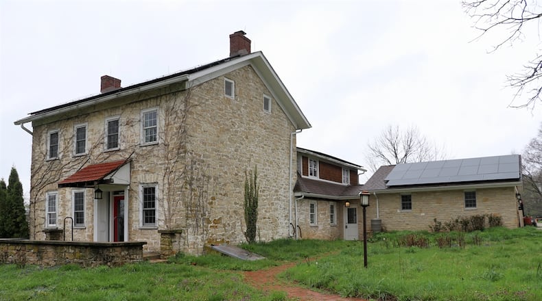 Listed for $1,400,000, the country estate at 1594 W. Dayton Yellow Springs Road sits on 5.719 acres hidden behind mature trees and a gated fence. CONTRIBUTED PHOTOS/KATHY TYLER