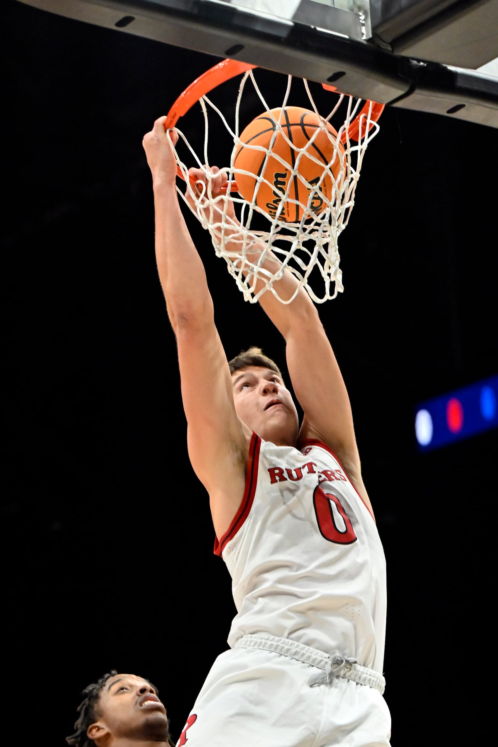 Rutgers guard Jordan Derkack (0) dunks the ball against Alabama during the first half of an NCAA college basketball game Wednesday, Nov. 27, 2024, in Las Vegas. (AP Photo/David Becker)