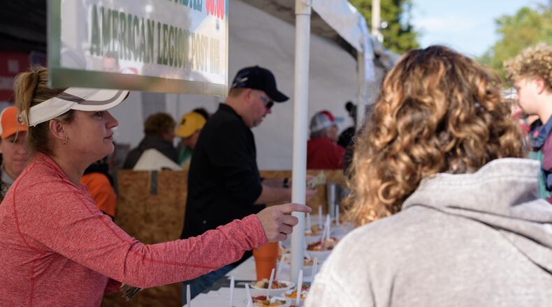 The 49th annual Ohio Sauerkraut Festival took place in downtown Waynesville this weekend on Saturday, Oct. 13 and Sunday, Oct. 14.  The festival combines 60 sauerkraut-related food items with 460 craftspeople from 25 states and attracts over 350,000 people annually. TOM GILLIAM / CONTRIBUTING PHOTOGRAPHER