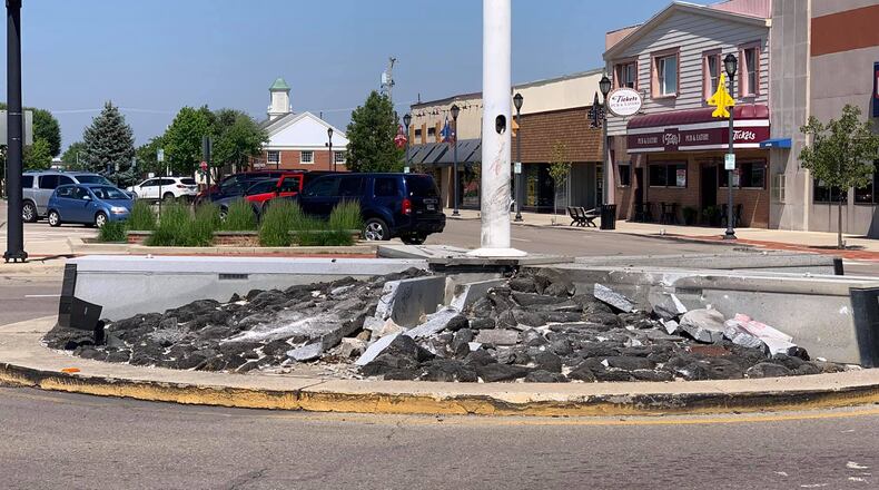 Damage done to the veterans memorial in downtown Fairborn. The flagpole was later removed.